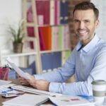 man working as a business administrator